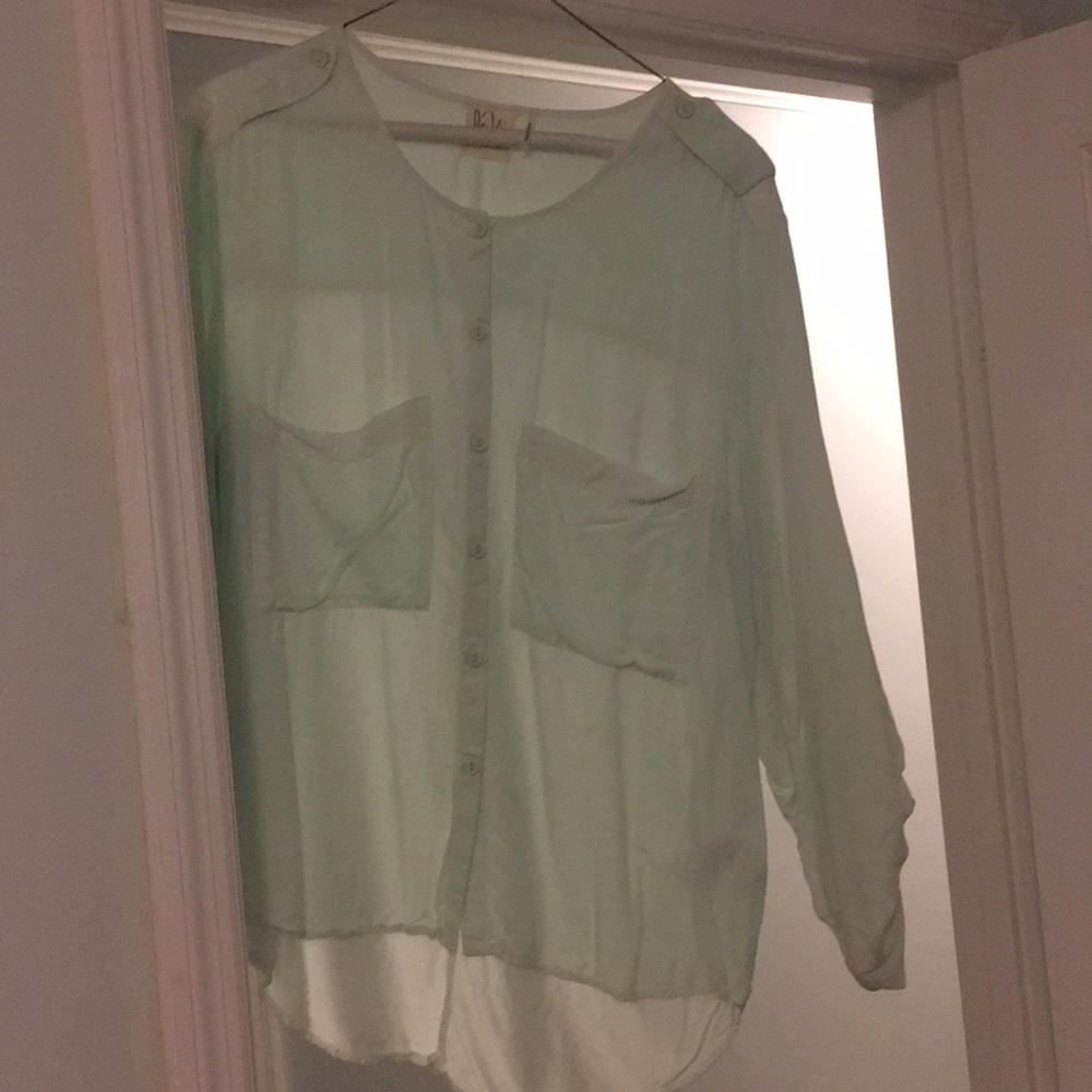 Pale green button down shirt